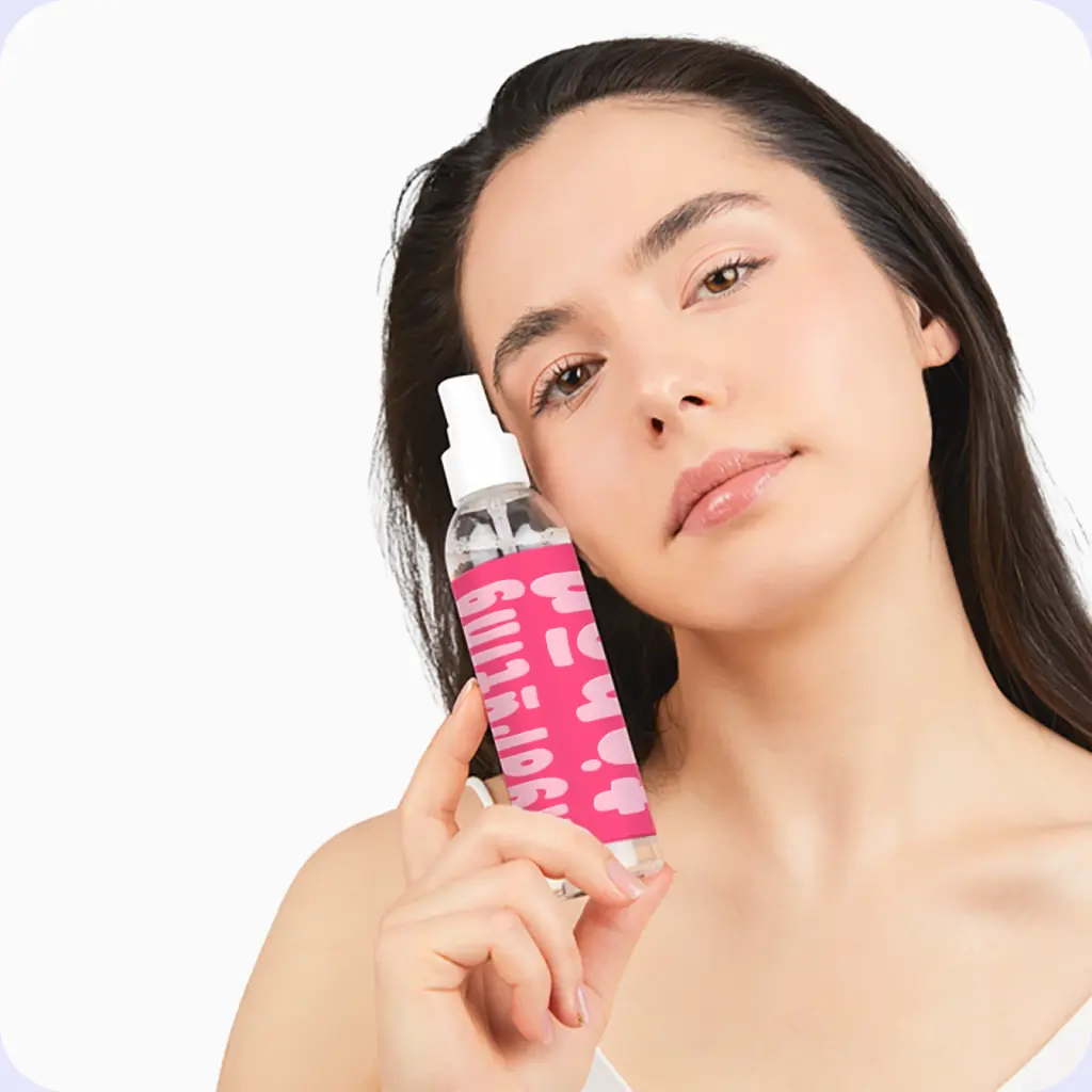 Hydrating Toner - Sense Serenity Cotton Candy - a woman holding the product next to her face